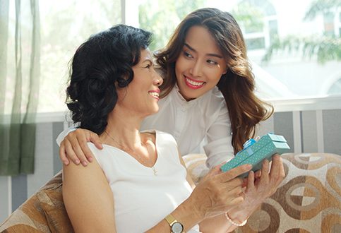 Mom and daughter with Mother's Day gift for mom